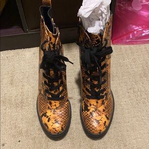 Steve Madden-Latch yellow snake tie up bootie